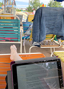 Writing my book at Elitch Gardens amusement park.